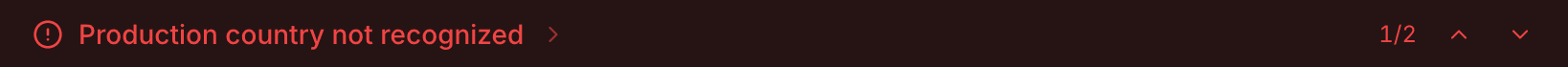 Red status bar showing the message Production country not recognized, the counter 1/2, and arrows to step through errors